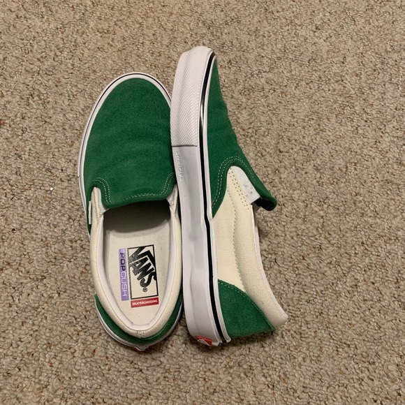 green and white slip on vans
only worn about two times
size 7 in mens, 8.5 in w - Picture 1 of 4